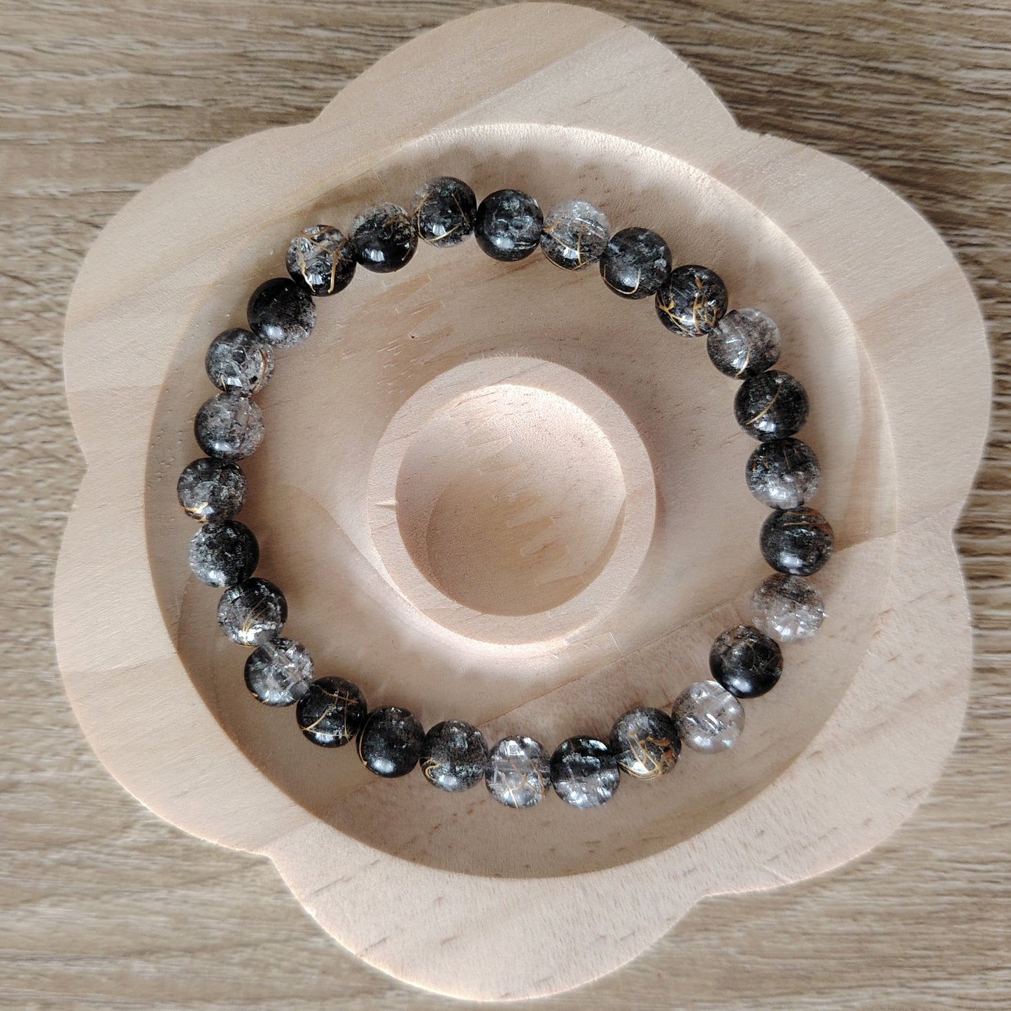 bracelet de perles noir et transparent