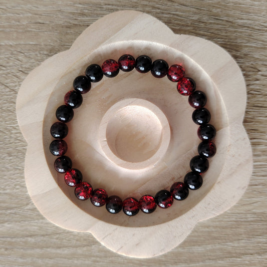 bracelet de perles noir profond au rouge intense